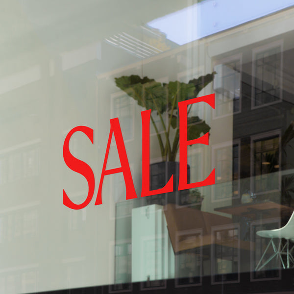 Computer cut self adhesive vinyl lettering serif font "Sale" Window Decal